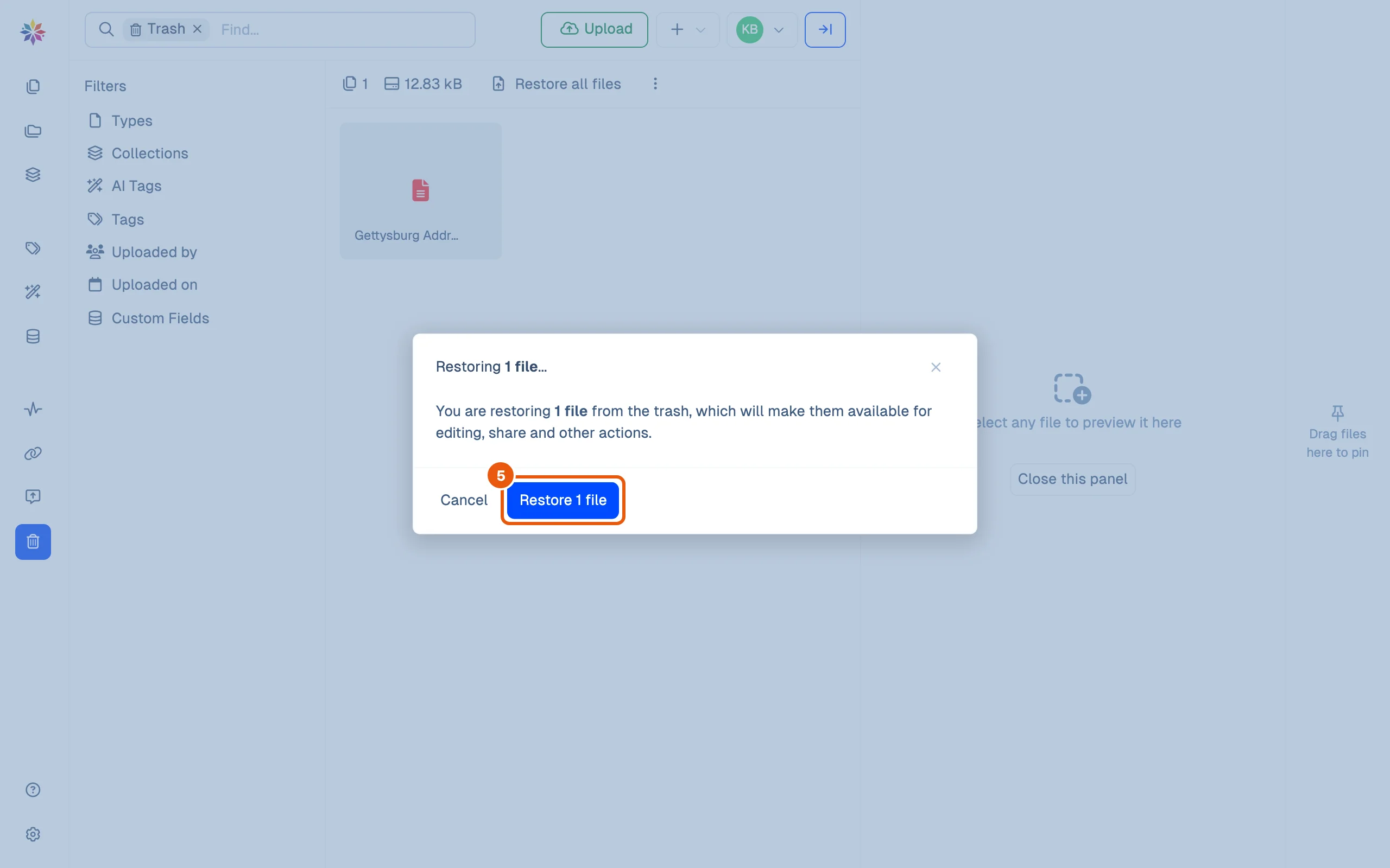 The Restoring 1 file dialog: the file will be available again for editing, sharing and other actions. Cancel and Restore 1 file.